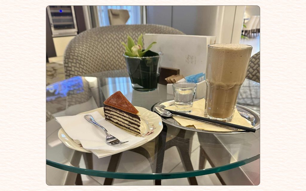 Dobos cake and coffee served at Zsolnay Café in Budapest